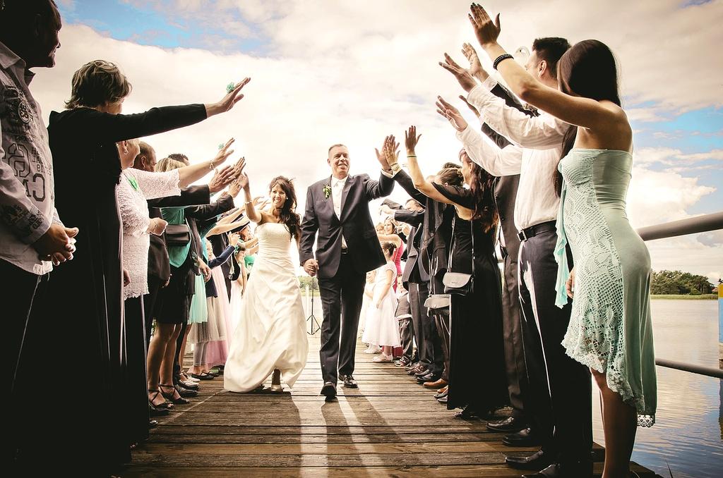 Before and after of wedding photo with removed photobomber